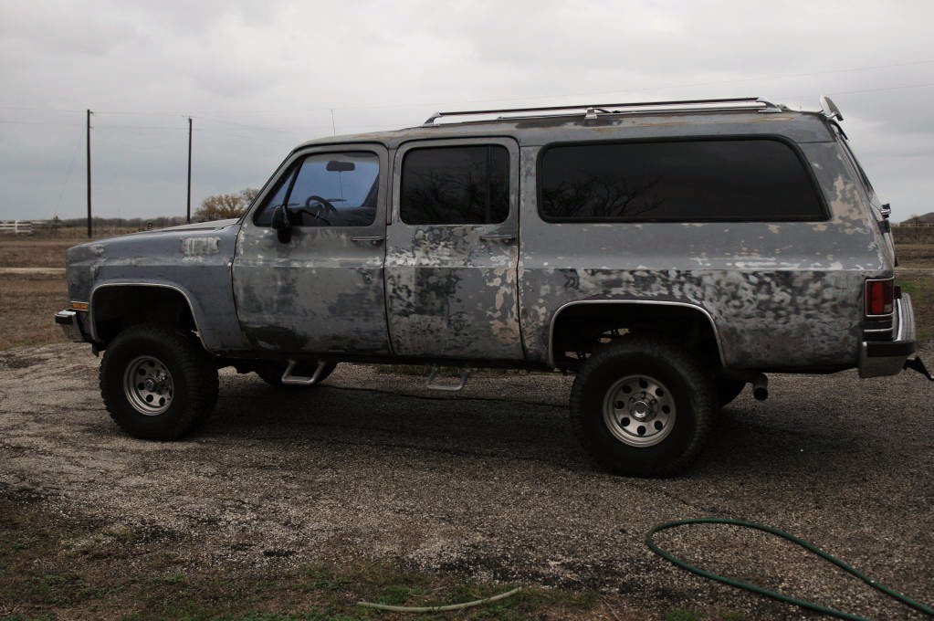 1990 Chevrolet Suburban being stripped for painting