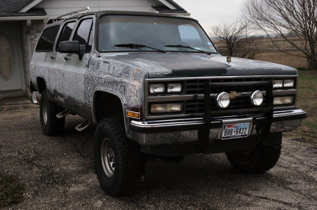 1990 Chevrolet Suburban being stripped for painting